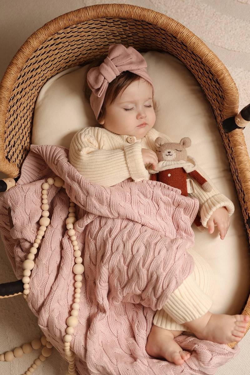 Bamboo baby blanket knitted with cable pattern | Pink main image